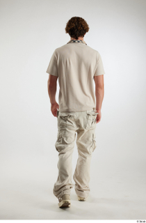 Lyle  1 back view beige cargo pants beige polo…